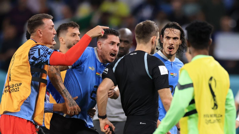 Uruguay aggresively confronting referee after Ghana match